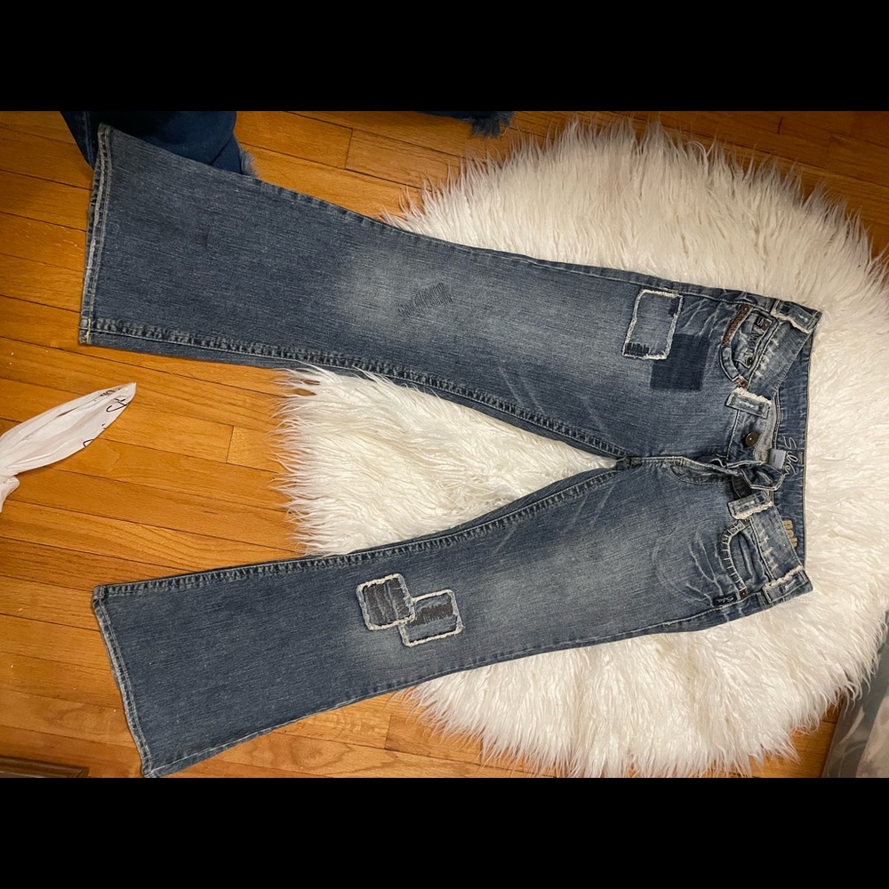 Silver brand jeans flare legged like new with detailed patchwork. $350 new
